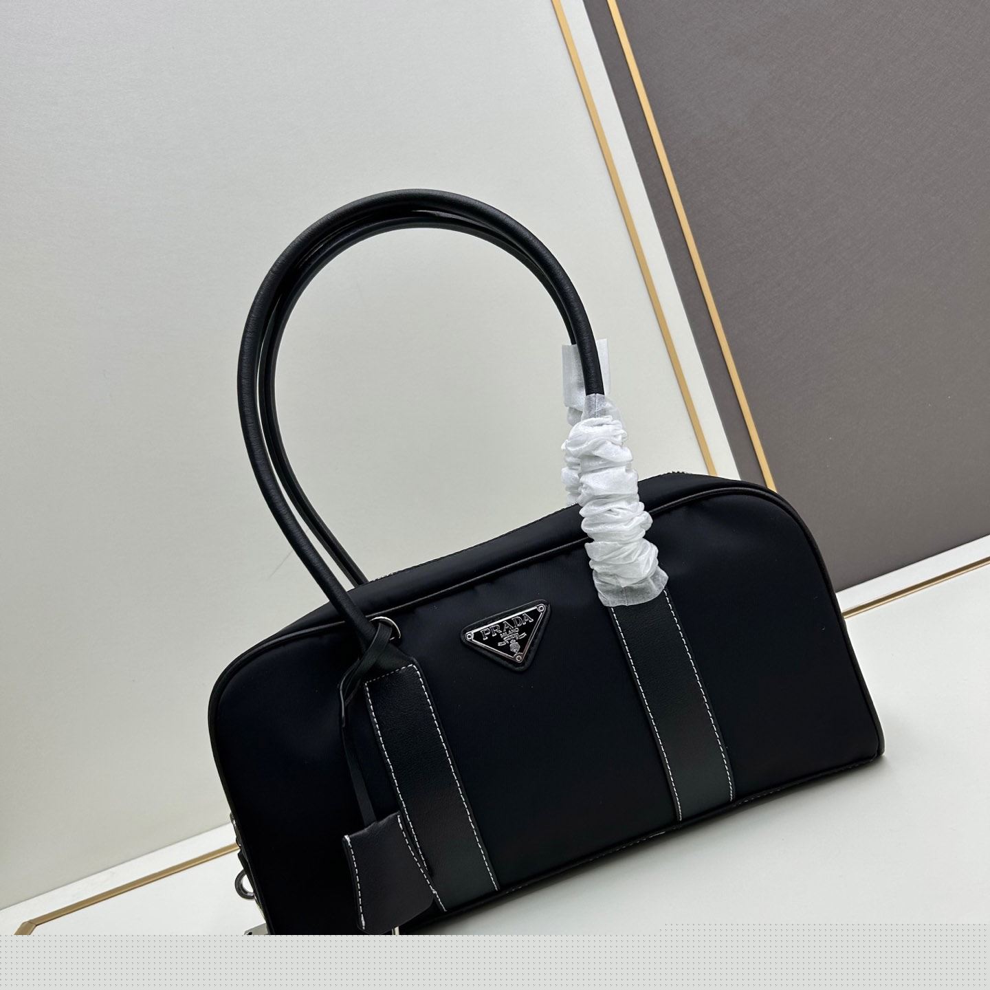 Pra*a top handle bags